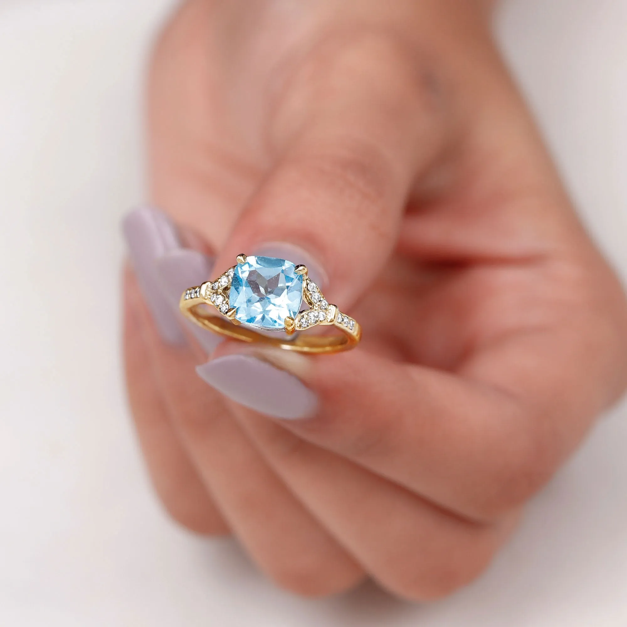 2.75 CT Cushion Cut Swiss Blue Topaz Solitaire with Diamond Side Stone Ring