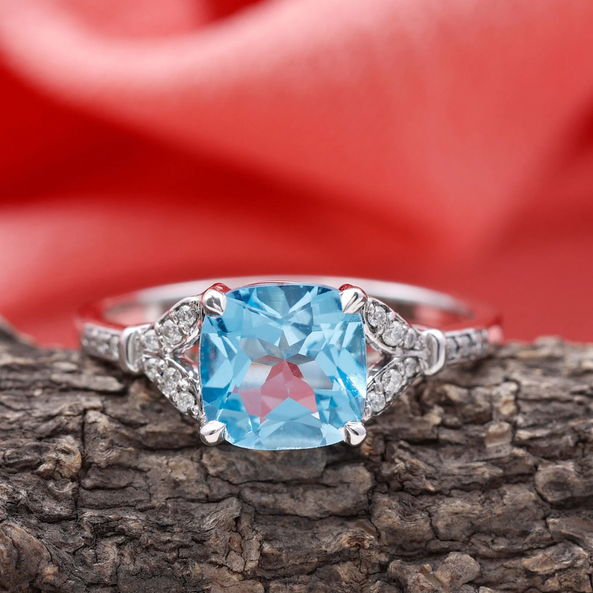 2.75 CT Cushion Cut Swiss Blue Topaz Solitaire with Diamond Side Stone Ring