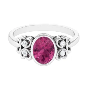 Bezel Set Oval Pink Tourmaline Statement Engagement Ring with Diamond
