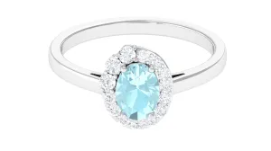 Classic Sky Blue Topaz Oval Cocktail Ring with Diamond Halo