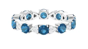 Designer London Blue Topaz and Diamond Eternity Ring