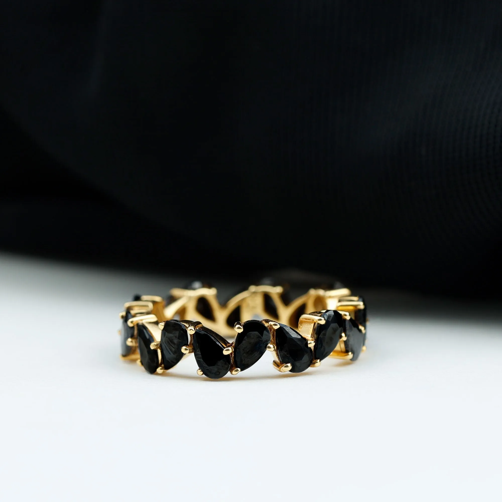 Elegant Pear Shape Black Onyx Tilted Eternity Band Ring in Gold