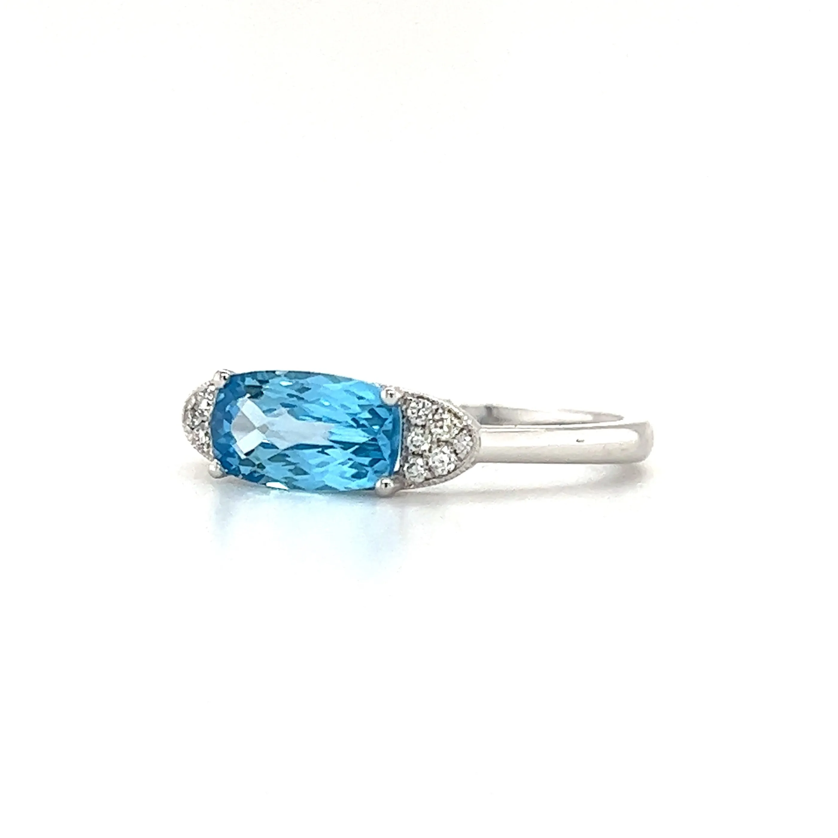 Elongated Blue Topaz Ring with Twelve Side Diamonds in 14K White Gold