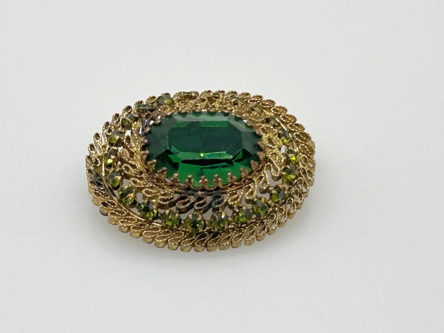 Fine Antique Filigree Austria Oval Brooch with Green Stones