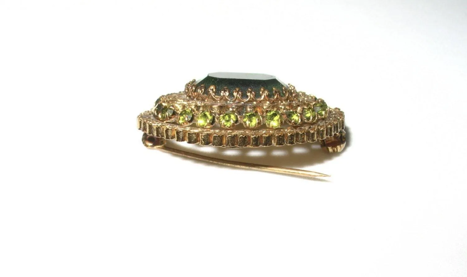 Fine Antique Filigree Austria Oval Brooch with Green Stones