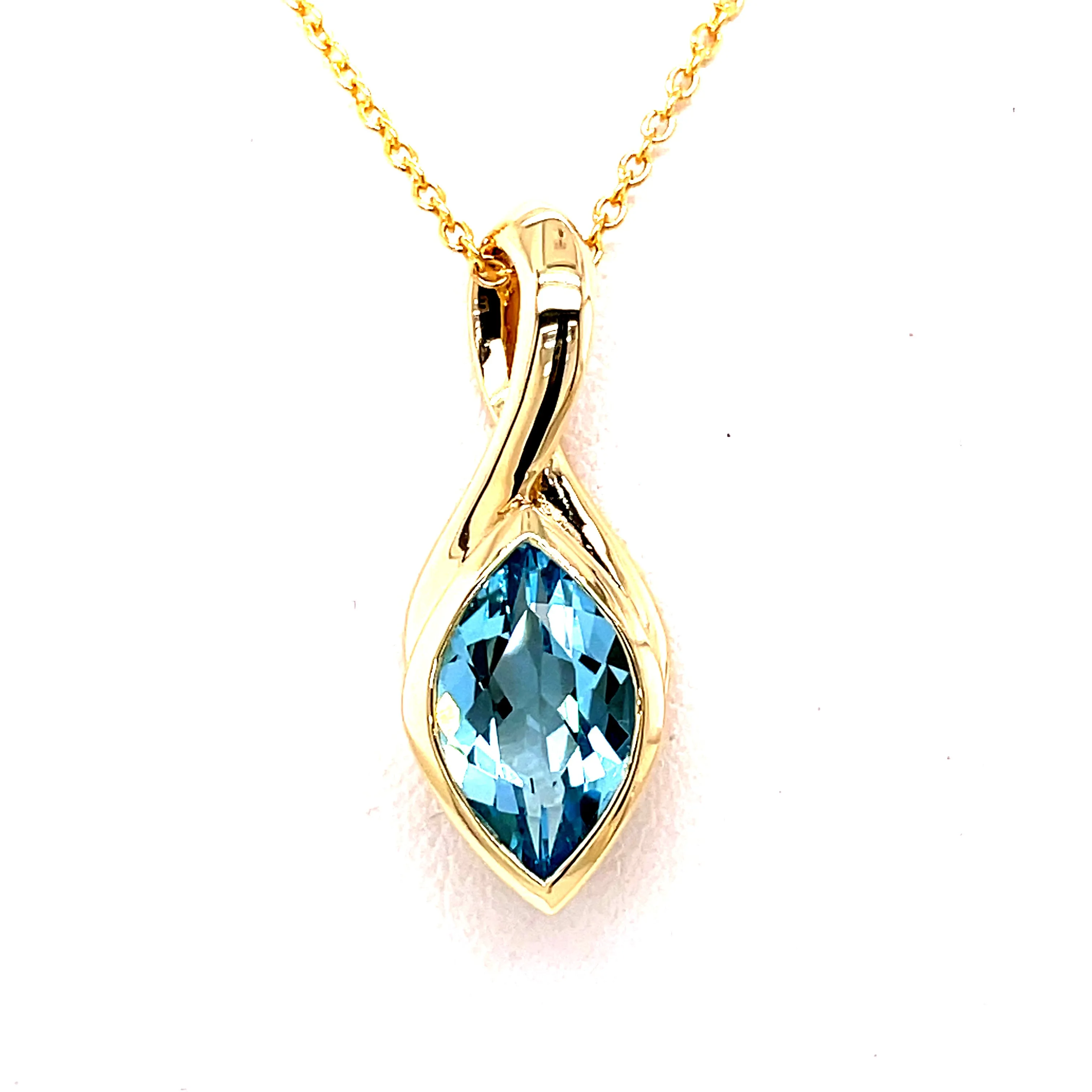 Kaleidoscope Marquee Blue Topaz Cross Over Pendant in Gold