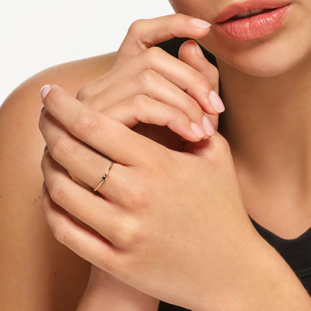 Micro Blue Topaz Round Solitaire Ring in 10k gold