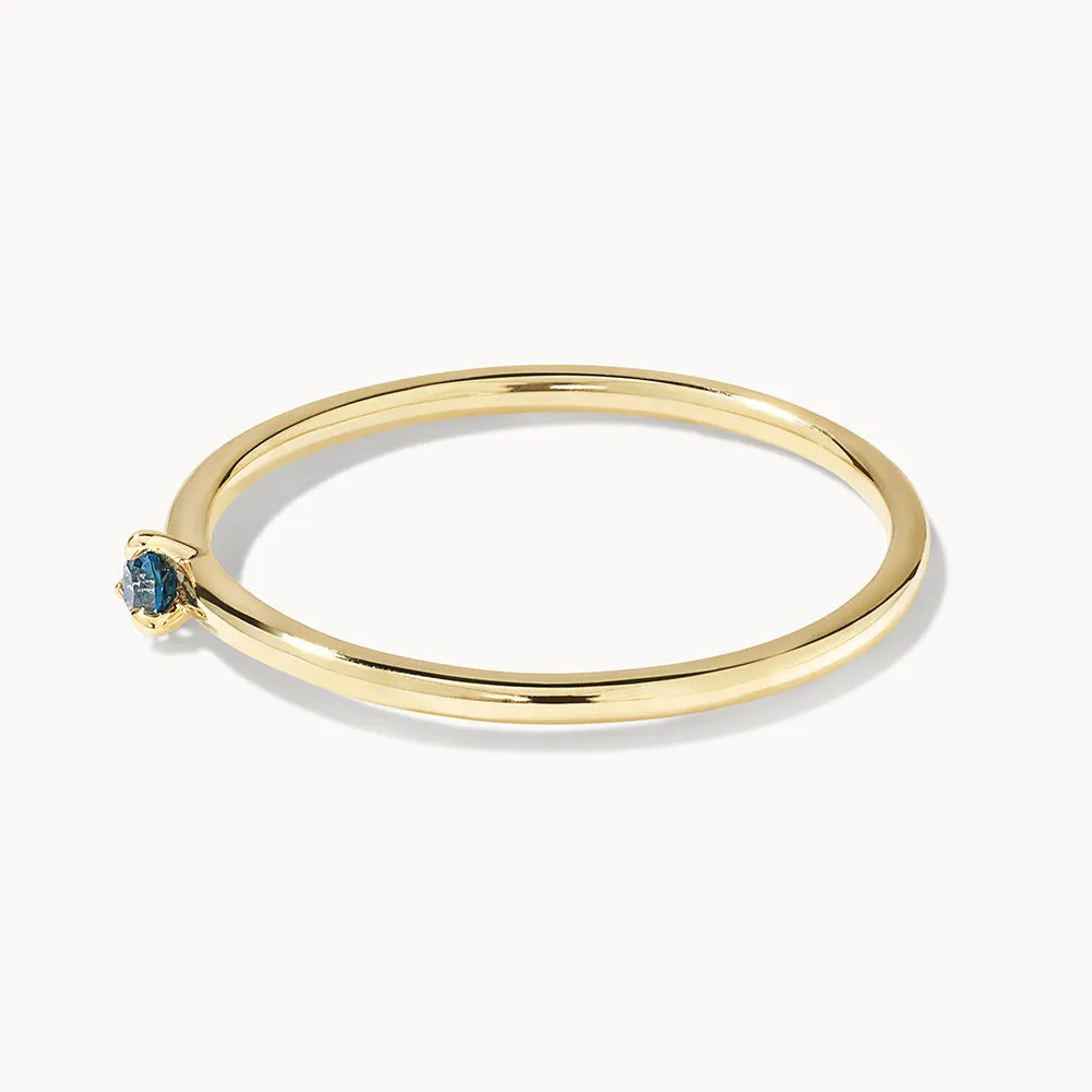 Micro Blue Topaz Round Solitaire Ring in 10k gold