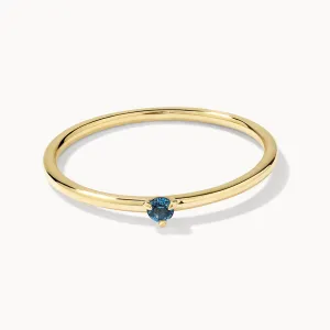 Micro Blue Topaz Round Solitaire Ring in 10k gold