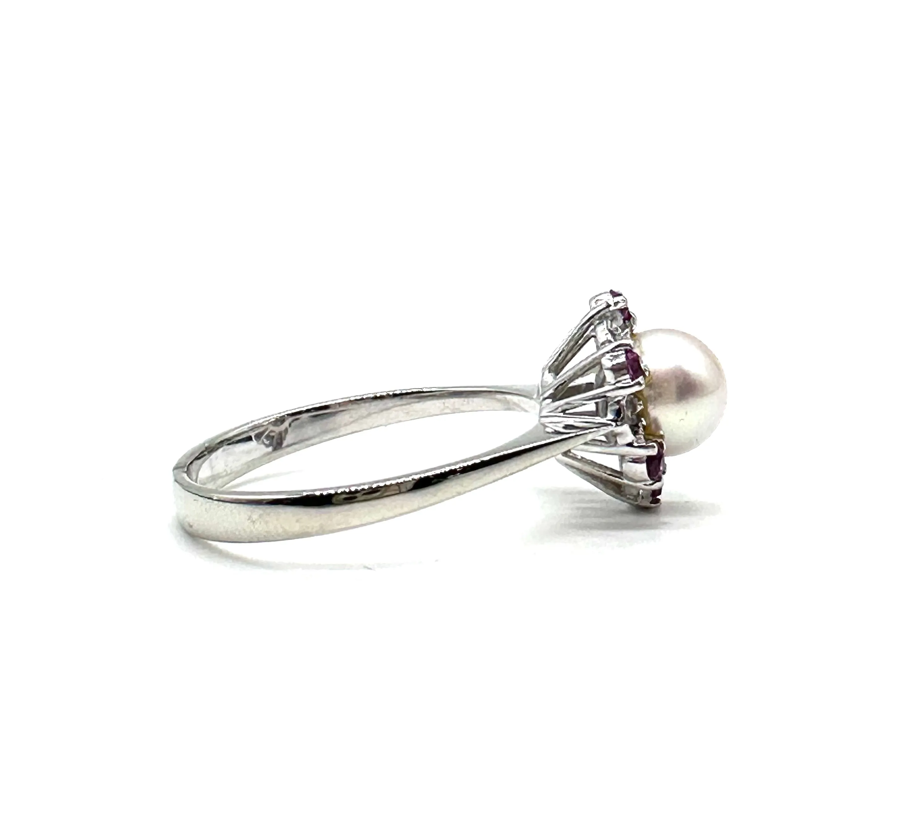 Pearl and Ruby halo ring