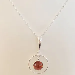 Sterling Silver Circular Amber Pendant Necklace