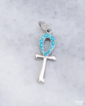 Turquoise Zircon Key Pendant